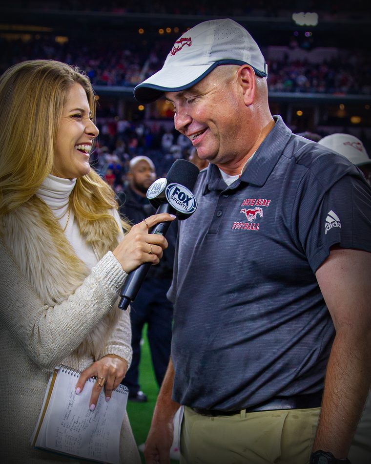 Sarah Merrifield reporting on the sideline